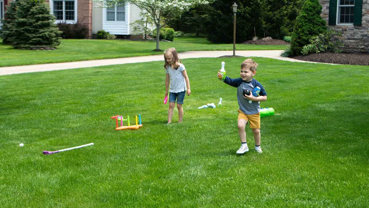 kids playing in nice looking lawn(5)