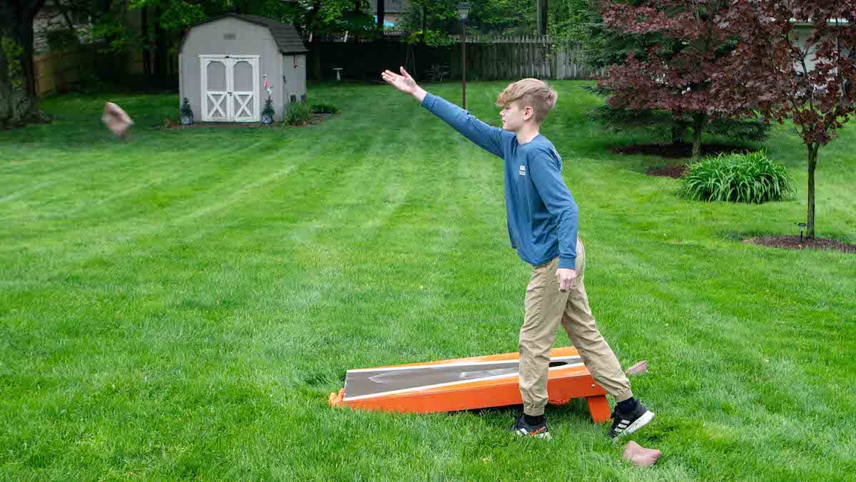 kids playing on their nice green lawn