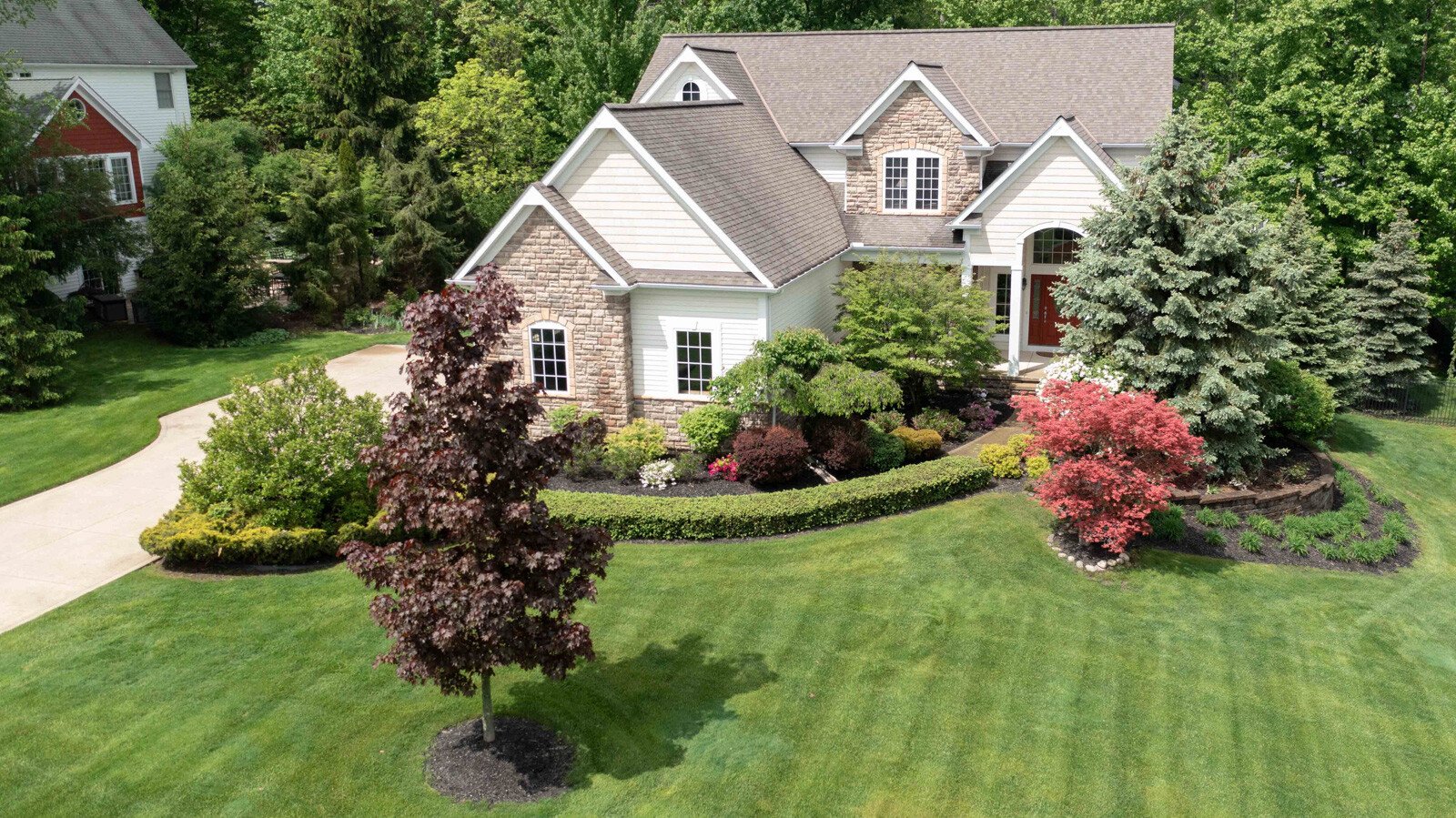 front of house green lawn large yard 